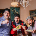 The Sooshi Mango trio in their Italian restaurant Johnny, Vince & Sam’s in Lygon Street.