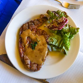Steak with pepper sauce.