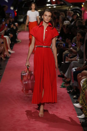 A red version of the shirt dress Meghan Markle wore on the afternoon of the first day of the tour on the runway at the Brandon Maxwell show at New York Fashion Week in September.