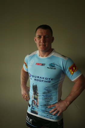 Paul Gallen models the jersey Cronulla will wear in his honour on Sunday.