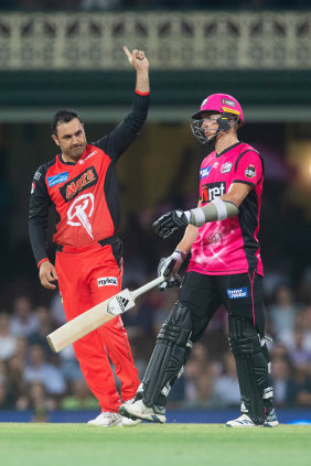 All out: Renegades bowler Mohammad Nabi gets Sixers top-scorer Tom Curran leg before wicket.