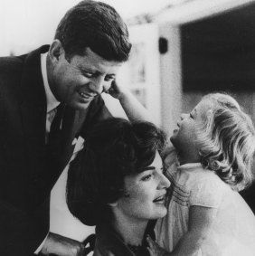 With JFK and daughter Caroline in 1960, shortly before she became first lady.