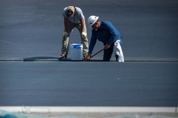 Workers on the renovation project in June.