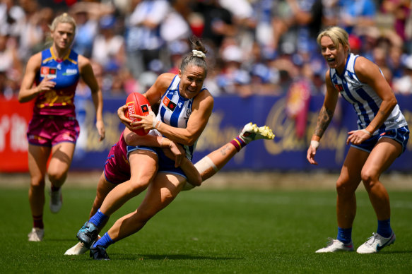 Emma Kearney is tackled.