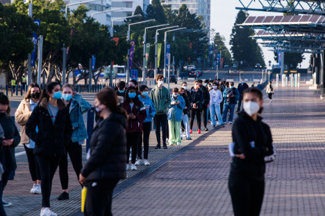 Hundreds of Year 12 students queue for their first dose of the Pfizer vaccine at Qudos Bank Arena on Monday morning.