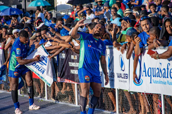 The Drua celebrate their last home win against the Crusaders with fans