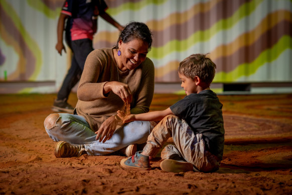 Opening night guests at Parrtjima, when Mulga Bore Rock Band will play next weekend.