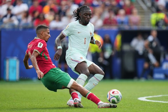 France’s Manu Kone challenges Azzedine Ounahi.