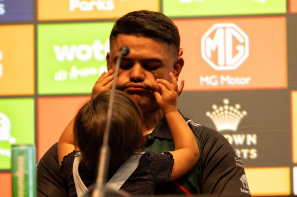 Latrell Mitchell and his rugby league-loving daughter Aleena when he re-signed with Souths last year.