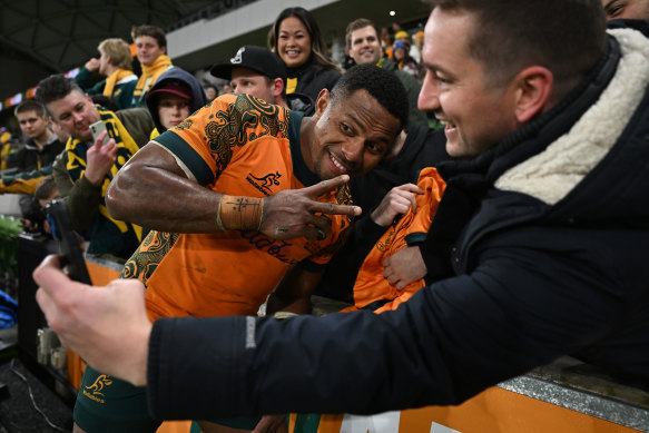 Filipo Daugunu smiles with fans after the Wallabies’ win.