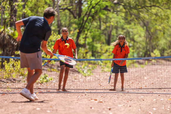 Tennis coach Anzac Leidig, pictured teaching in Darwin, says Ashleigh Barty has been an inspiration to Indigenous kids. 