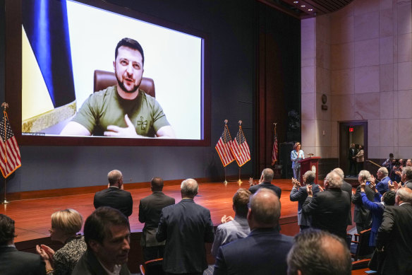 Members of Congress give Ukraine President Volodymyr Zelensky a standing ovation earlier this month. 