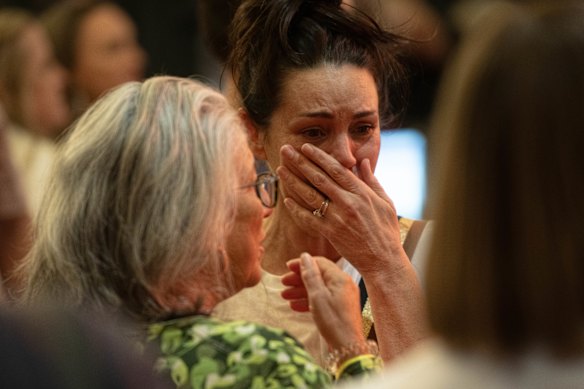 Yes campaign supporters at Wests Ashfield Leagues Club react to the news that the referendum has been defeated.