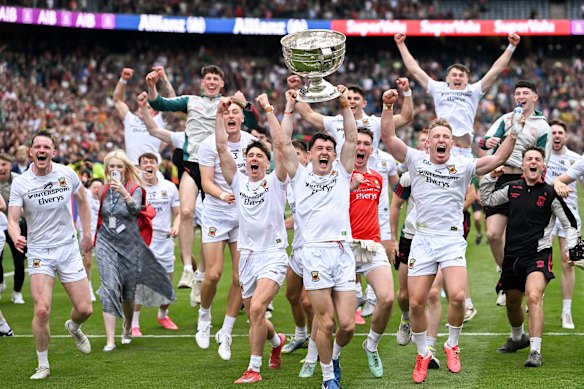 Mayo captain Jack Coyne and his teammates celebrate victory - and breaking the curse - in the All-Ireland final.