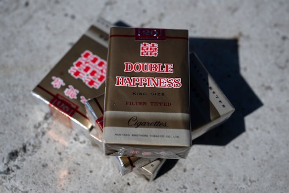 Illegal Double Happiness cigarettes are sold in stores starting at $13.