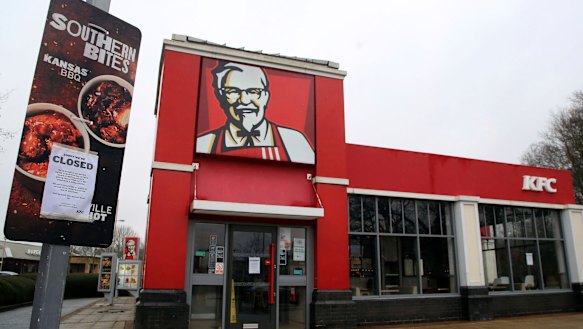 A closed sign is seen outside a KFC restaurant near Ashford, England, 