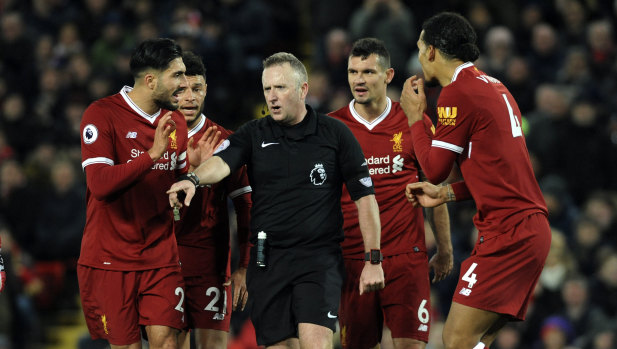 Referee Johnathan Moss awards the second penalty in the Liverpool-Spurs game.