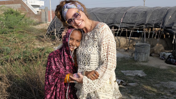 Fashion designer and burgeoning philanthropist Camilla Franks with her friend Jenu on tour in India. 
