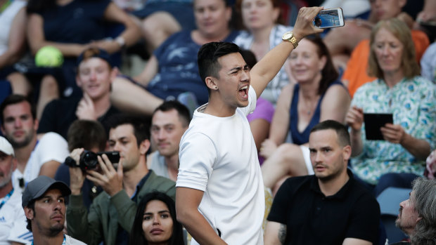 Jamie Zhu, a YouTube prankster, was ejected from Hisense Arena during Nick Kyrgios' second round Australian Open match.