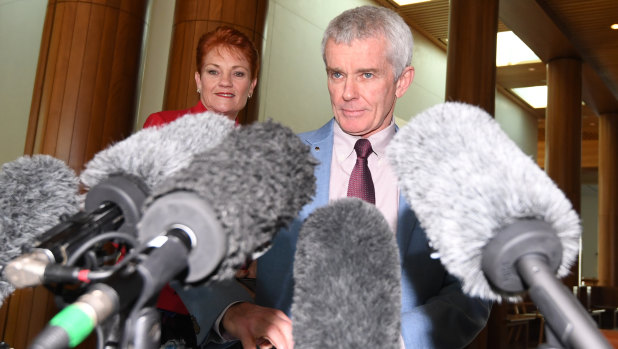 Malcolm Roberts, pictured with federal One Nation leader Pauline Hanson, will contest the seat of Ipswich.