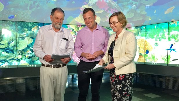 Environment Minister Steven Miles (centre) launches the Great Barrier Reef Report Card 2015-16 with Independent Science Panel chairman Dr Roger Shaw and Terrain NRM CEO Carole Sweatman.