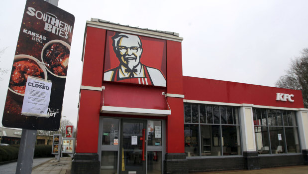 A closed sign is seen outside a KFC restaurant near Ashford, England, 