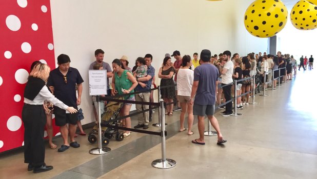GOMA guests queue to experience 'Yayoi Kusama: Life is the Heart of Rainbow', which runs until February 11.