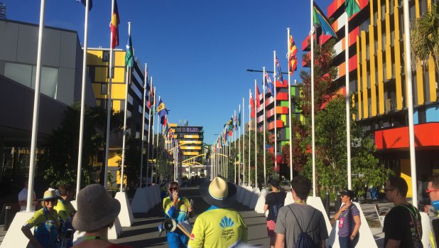 Gold Coast Commonwealth Games staff show guests through the athletes village.