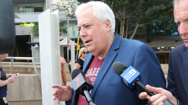Clive Palmer arrives at the Federal law courts in Brisbane.