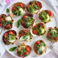 Danielle Alvarez’s scallops baked in the half-shell with tomatoes and herbed breadcrumbs.