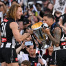 Magpies seal flag with a KISS and earn begrudging respect ... but the rest of us still hate them