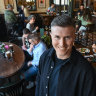 Bar owner Liam Ganley in his just-renovated Irish bar, which has remained busy.