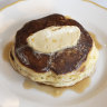 Ricotta and cacao husk pancakes with smoked maple syrup and espresso butter at Flora.