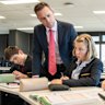 Maths teacher Simon Jenkins with year 8 students at Marist College North Shore.