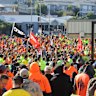 Members of the CFMEU protesting in Brisbane last month.