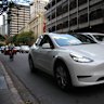 A Tesla Model Y on Ann Street in the Brisbane CBD. 