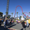 Village Roadshow’s theme parks including Movie World (pictured) and cinemas have been battered by COVID-19 restrictions over the past two years. 