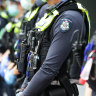 Victoria police officer facing more than 80 child sex charges, extradition sought