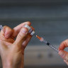 COVID-19 vaccine becomes mandatory for construction workers as Victoria records 1221 new cases