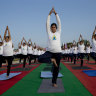Thousands of people get into a twist for Yoga Day