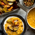 Spiced winter porridge recipe with honey and turmeric baked fruit.