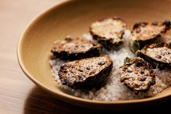Oysters are baked in the style of rarebit, with a cheesy topping.