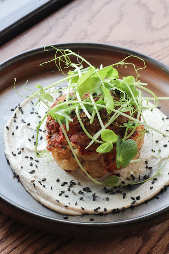 The menu showcases organic produce and ethically farmed meats.