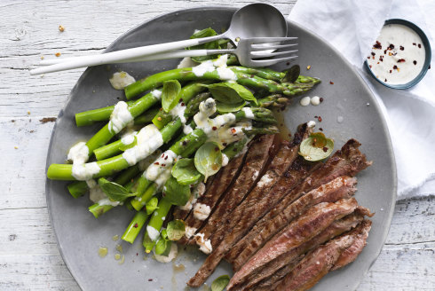 Streamlined recipes like Andrew McConnell’s grilled steak and asparagus make sense for one.