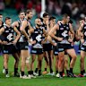 Carlton players after their loss to Sydney.