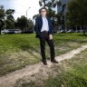 Ben Rossiter, executive officer at Victoria Walks, uses a desire path near Victoria Parade in the city.