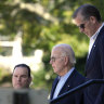 US President Joe Biden and his son Hunter leave St. Edmond Catholic Church in Rehoboth Beach, Delaware on Saturday.