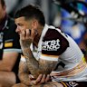 Adam Reynolds looks on from the bench after being injured in the grand final. Brisbane were lucky to hang on with a reshuffled backline.