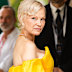 Anderson let the gown have its moment, teaming it with an elegant updo, low-key makeup and a necklace.