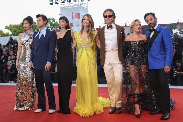 From left, Gemma Chan, Harry Styles, Sydney Chandler, director Olivia Wilde, Chris Pine, Florence Pugh and Nick Kroll at the Venice Film Festival.